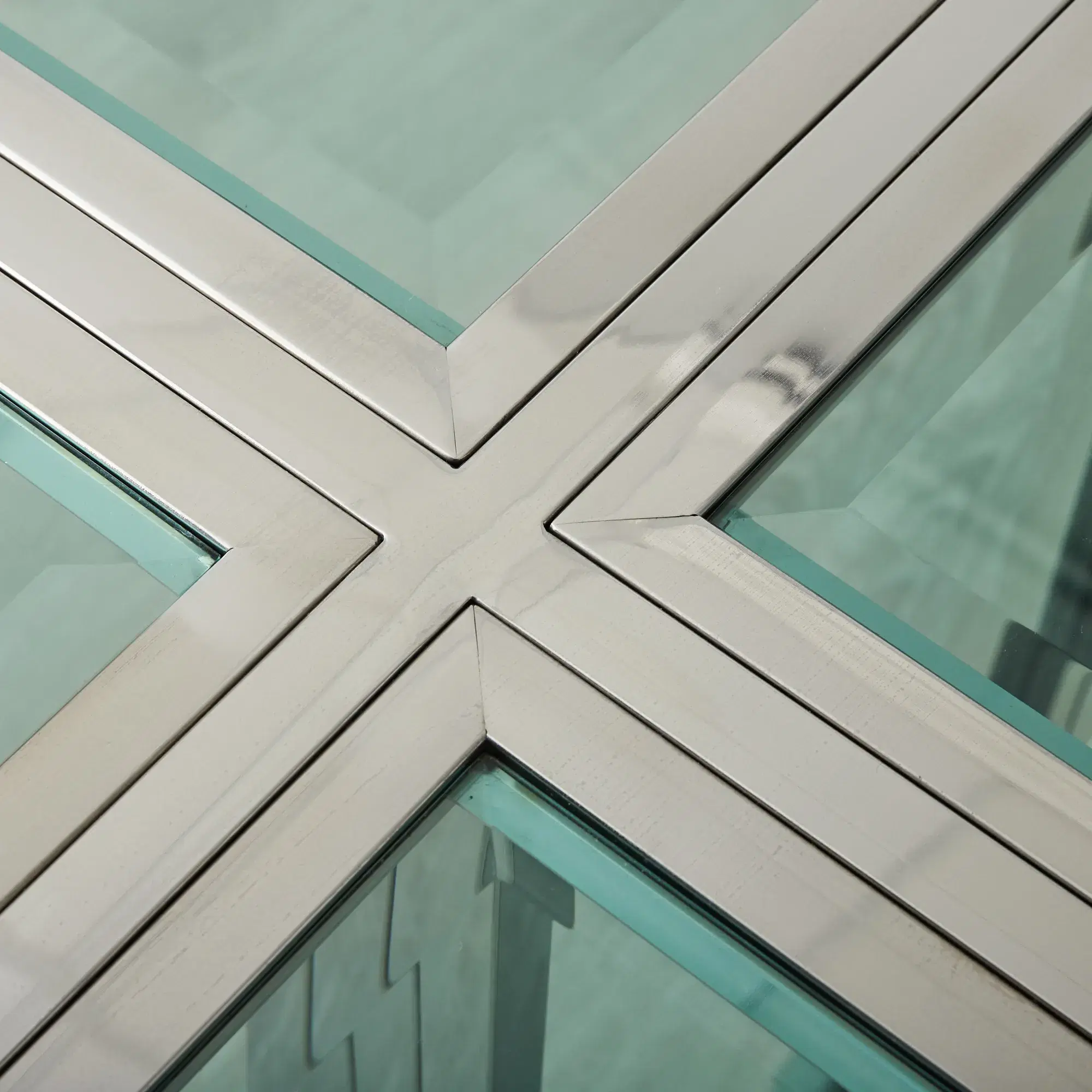 Titus Stainless Steel Dining Table - Smoke Green Glass Top